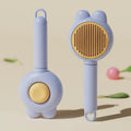 Green self-cleaning pet brush with release button and stainless steel comb for grooming cats and dogs