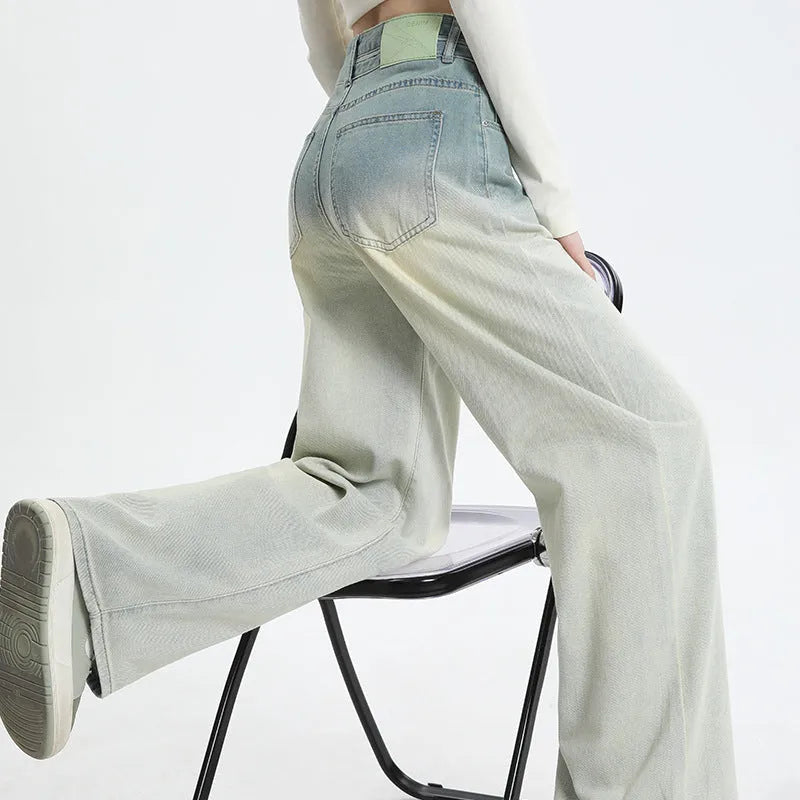 Women's gradient blue straight-leg denim trousers with wide leg fit on hanger