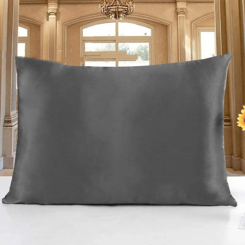 19 M double-sided silk pillowcase shown in one of 14 available colours, including apricot, sky blue, and black.