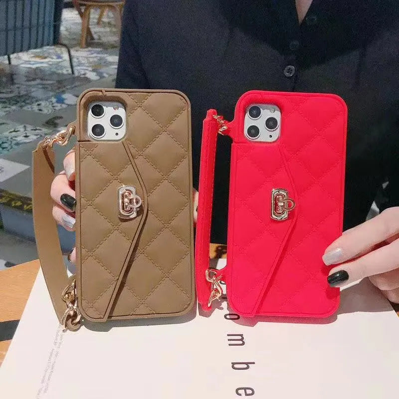 Silicone mobile phone case for iPhone with a decorative pearl chain lanyard attached.