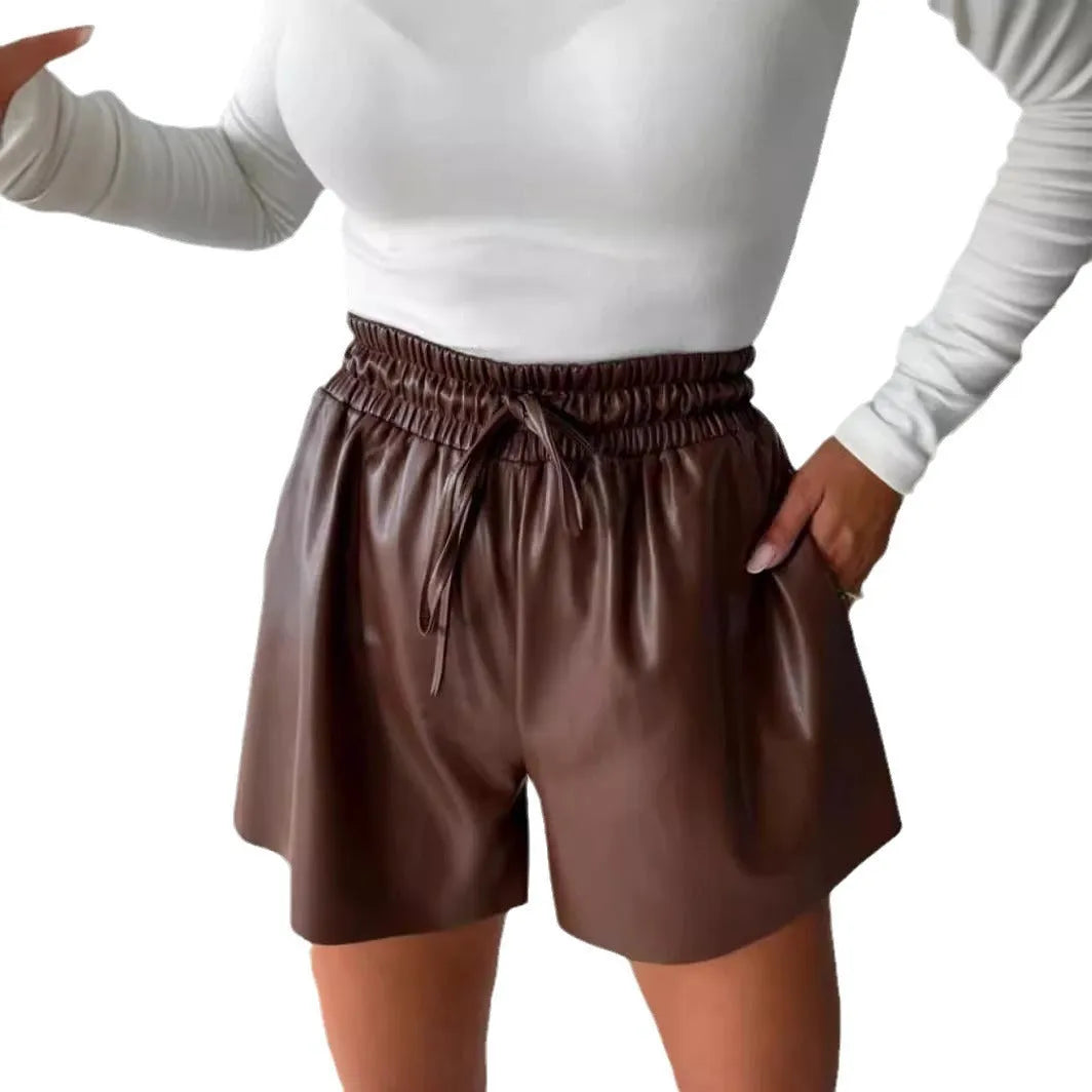 Black women's wide-leg casual shorts with a lace drawstring waist and PU leather trim details.