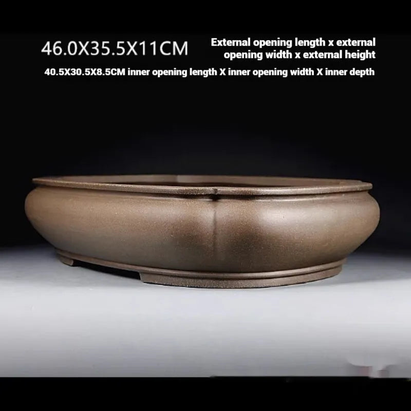 Handmade antique papaya-shaped purple clay flower pot measuring 46cm length
