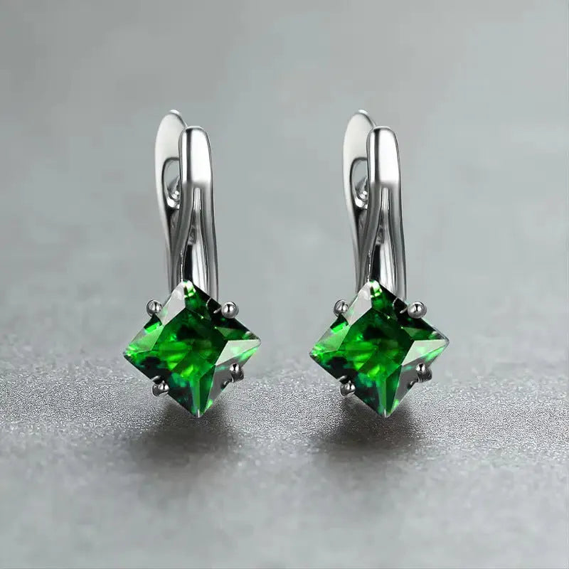 Women's copper earrings with inlaid zircon creating a diamond design, shown in blue, green, and colour options.
