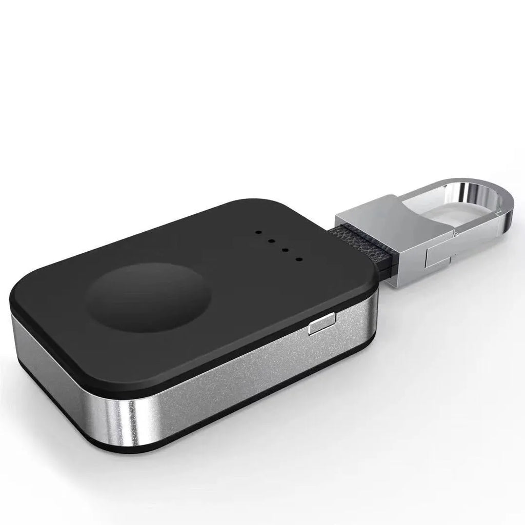 Black portable Apple Watch wireless charger power bank on a keychain.