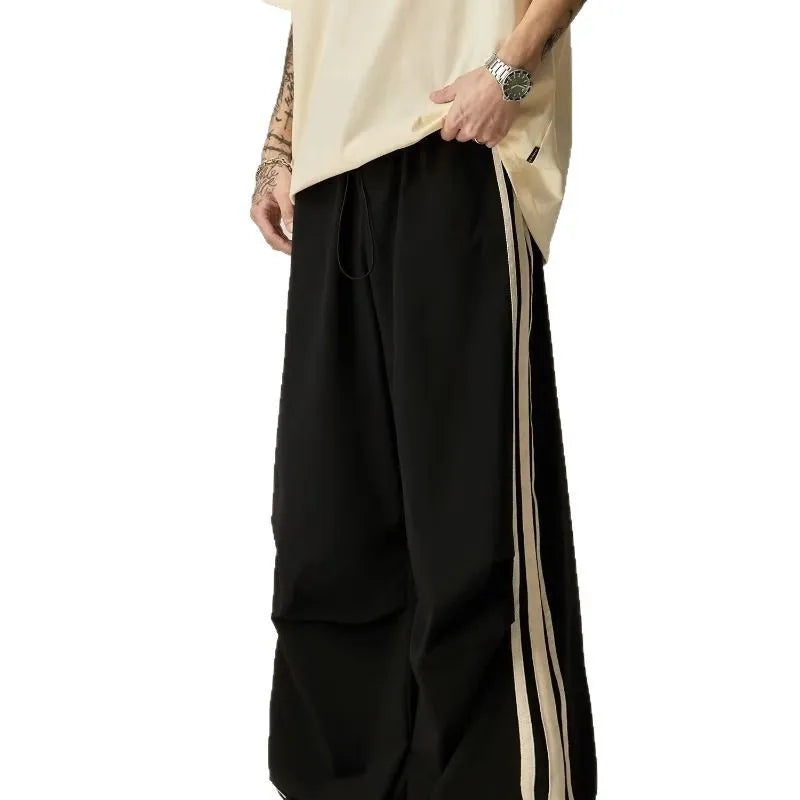 Black wide leg climbing trousers for men with high waist and straight leg cut