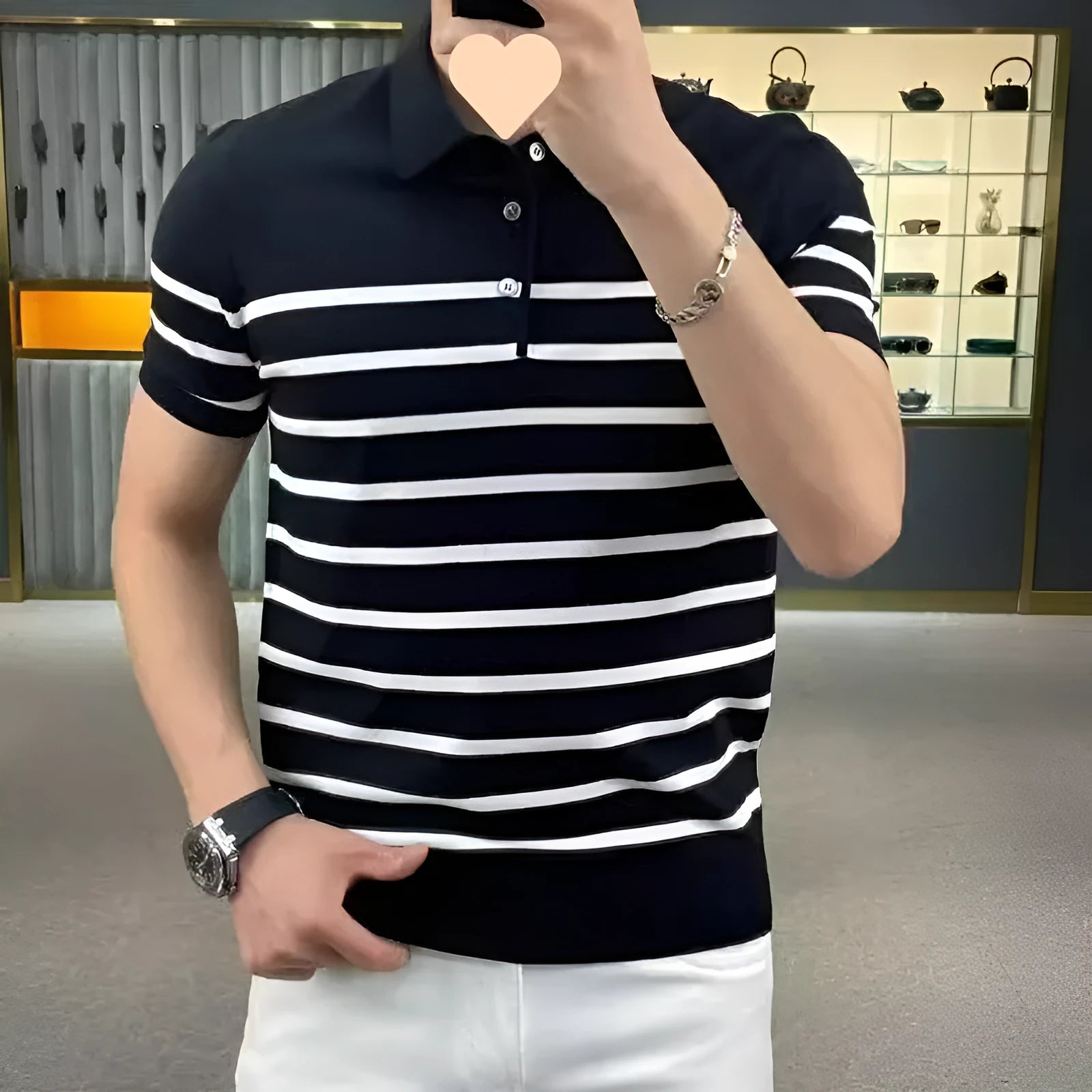 Men's black and white striped lapel collar knitted T-shirt pullover on hanger