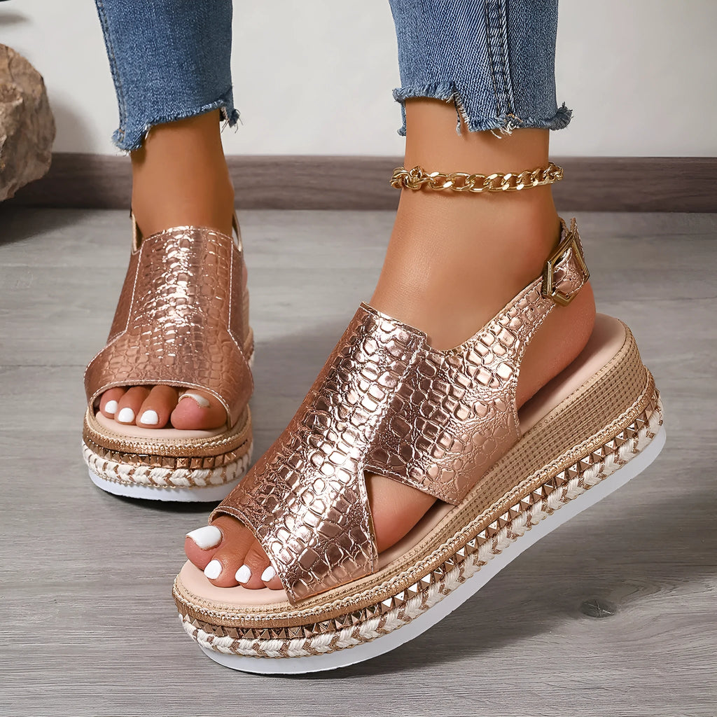 Gold roman sandals with round toe, ankle buckle, and hollow-out patterns on PU upper