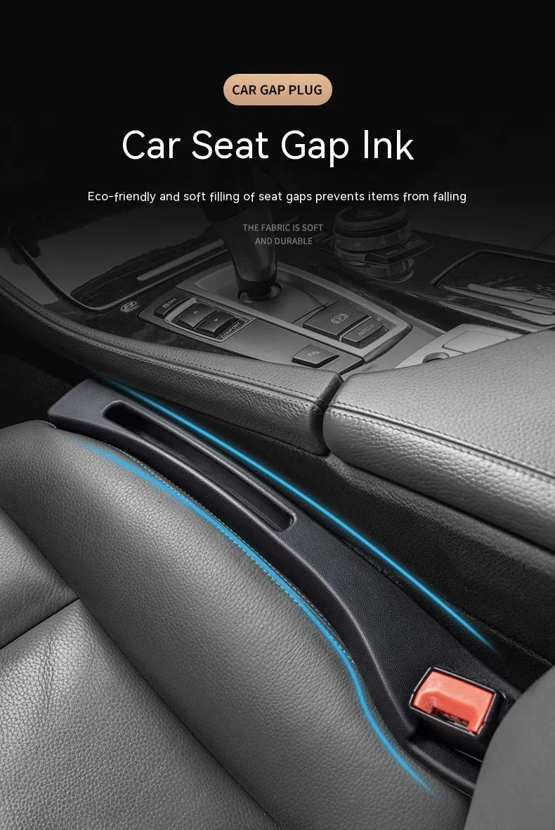 Black car seat gap storage box organiser with handle placed between vehicle seats