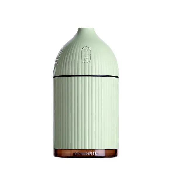 White ultrasonic aromatherapy diffuser with LED light, 300ml water tank, and USB cable.