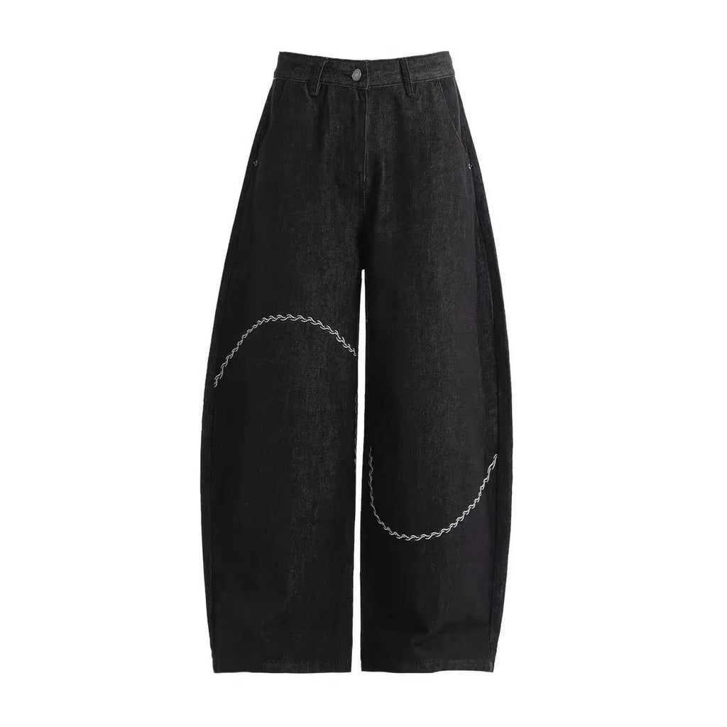 Black straight-leg denim trousers with mid-waist design and zip placket closure