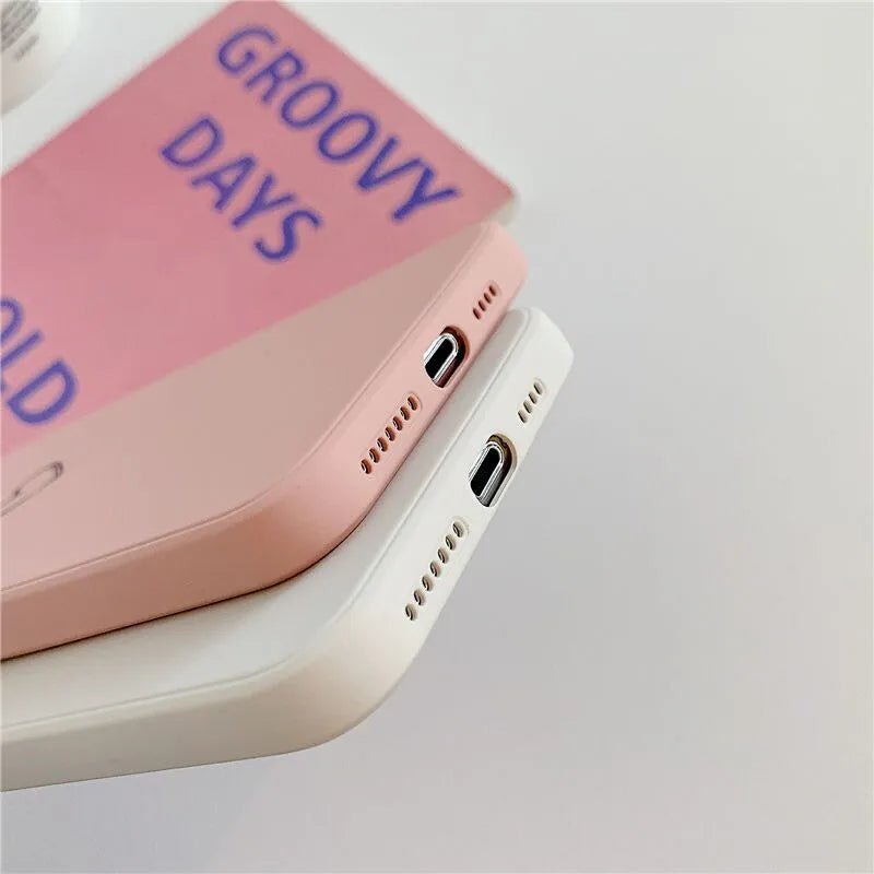 Silicone TPU phone case for Apple iPhone in solid colour options including black, green, pink, purple, red, and white.