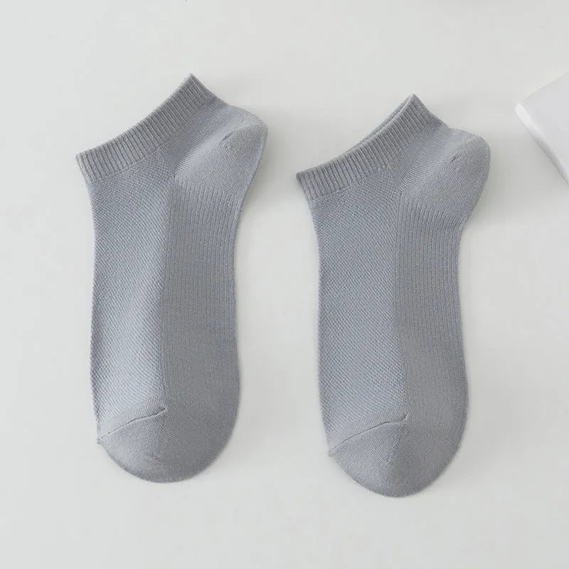 Solid colour low-cut polyester boat socks for men in a free size, shown in one of six available colour options.