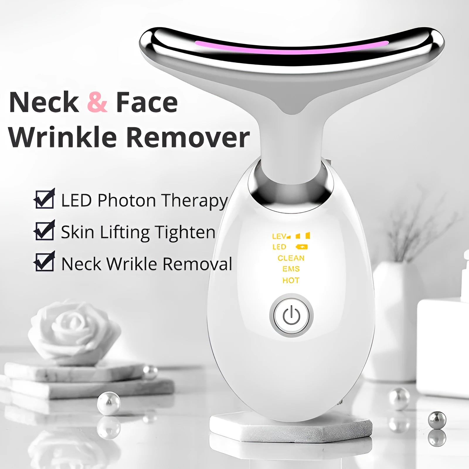 EMS thermal neck lifting massager device with LED lights on, shown on skin.
