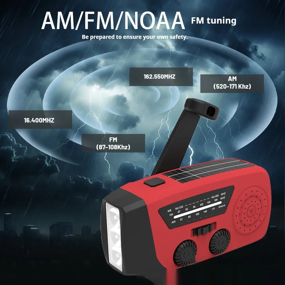 Red rechargeable emergency hand-crank radio with LED torch and USB port for disaster prevention