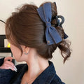 Handmade denim bow triangle hair accessory with fabric and acrylic decoration on plastic hairpin