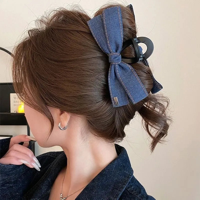 Handmade denim bow triangle hair accessory with fabric and acrylic decoration on plastic hairpin