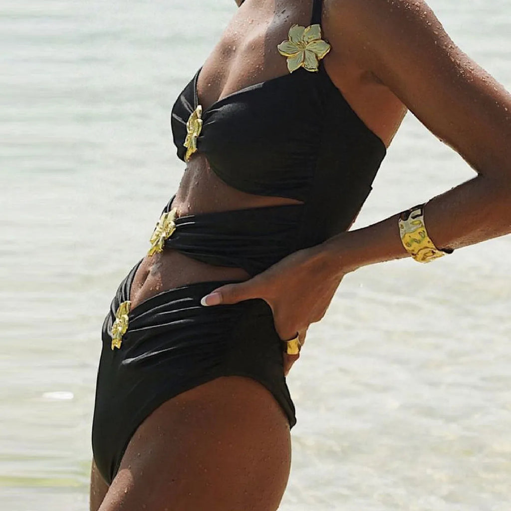 Women's solid colour one-piece swimsuit with attached short skirt and hollow-out tube top design