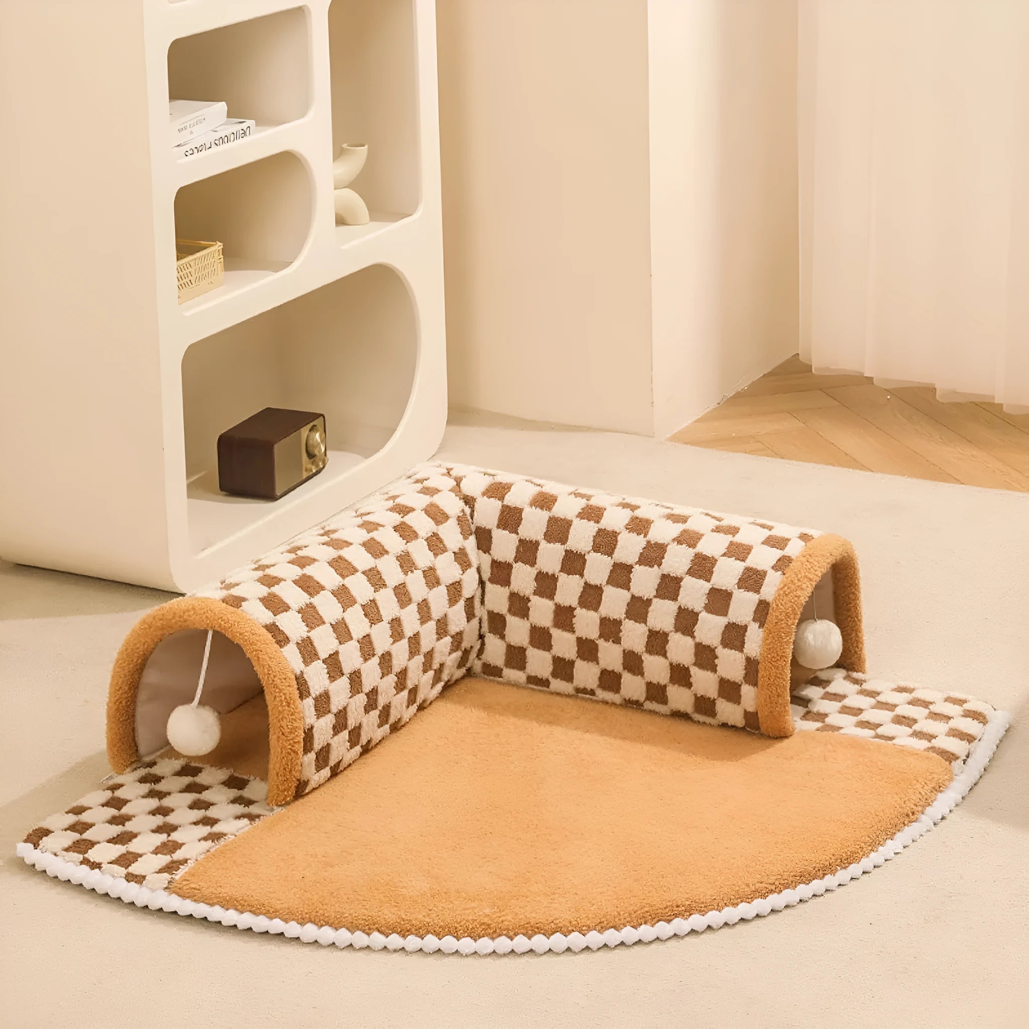 Coffee coloured plush 2-in-1 pet bed with a sleeping mat and an attached tunnel, showing anti-slip base.