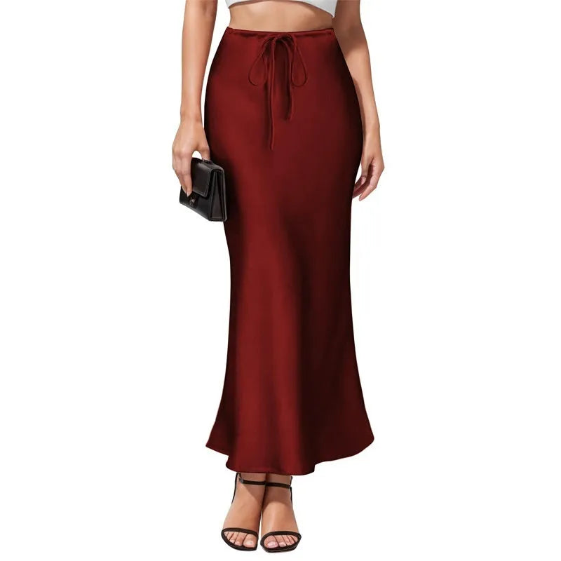 Asymmetric acetate satin skirt with irregular stitching detail in high waist design