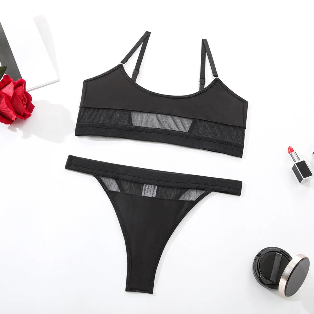 Women's black full cup bra and pants underwear set with adjustable straps on a mannequin.