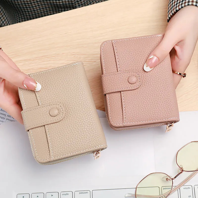 Beige ladies short wallet with lychee pattern, showing 2-fold PU construction.
