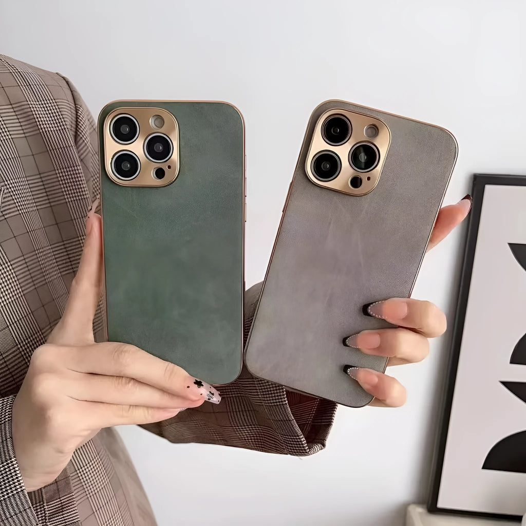 Solid colour leather texture TPU phone case for iPhone on a table, showing grey-green colour option.