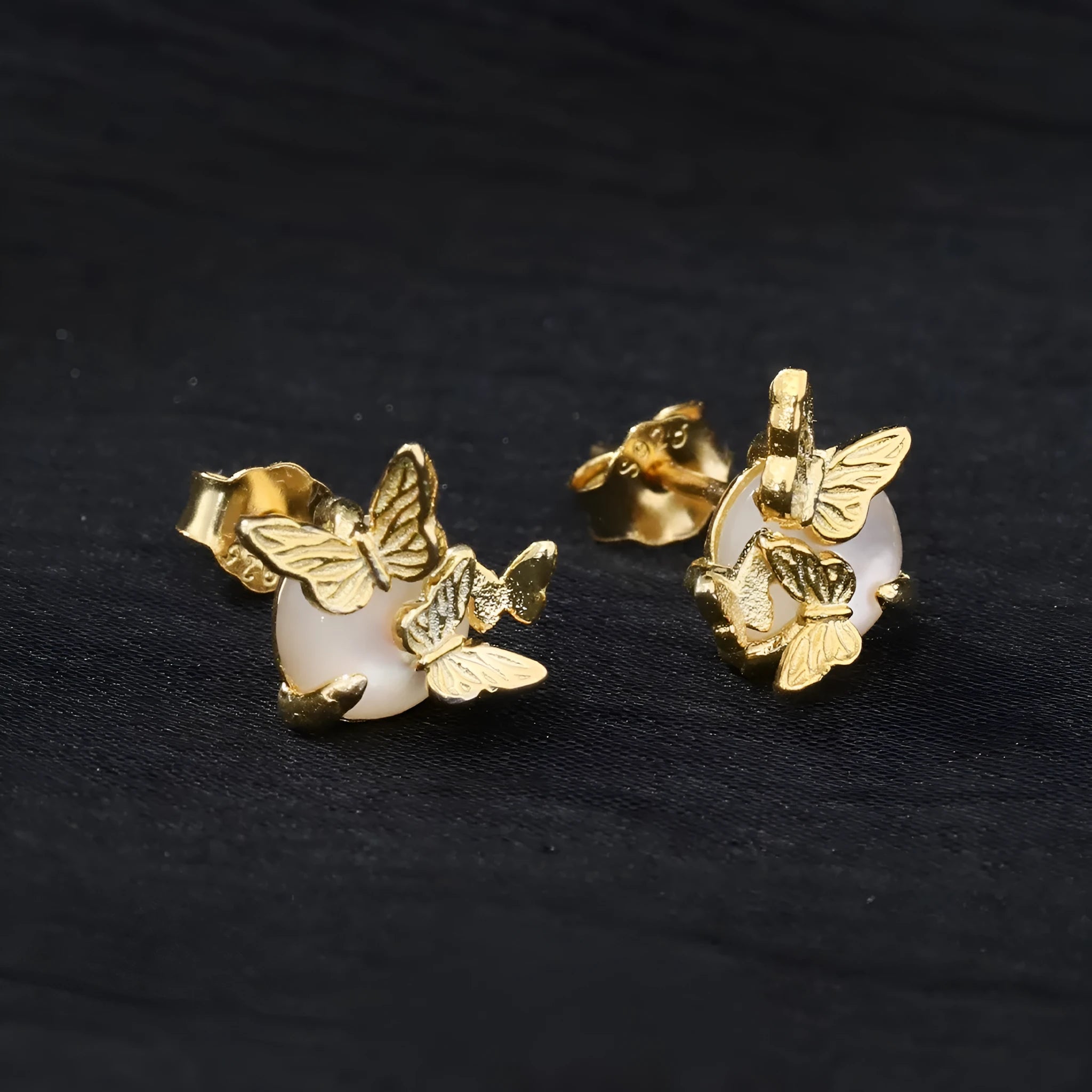 925 silver butterfly ear studs with electroplated finish in white gold or gold colour options