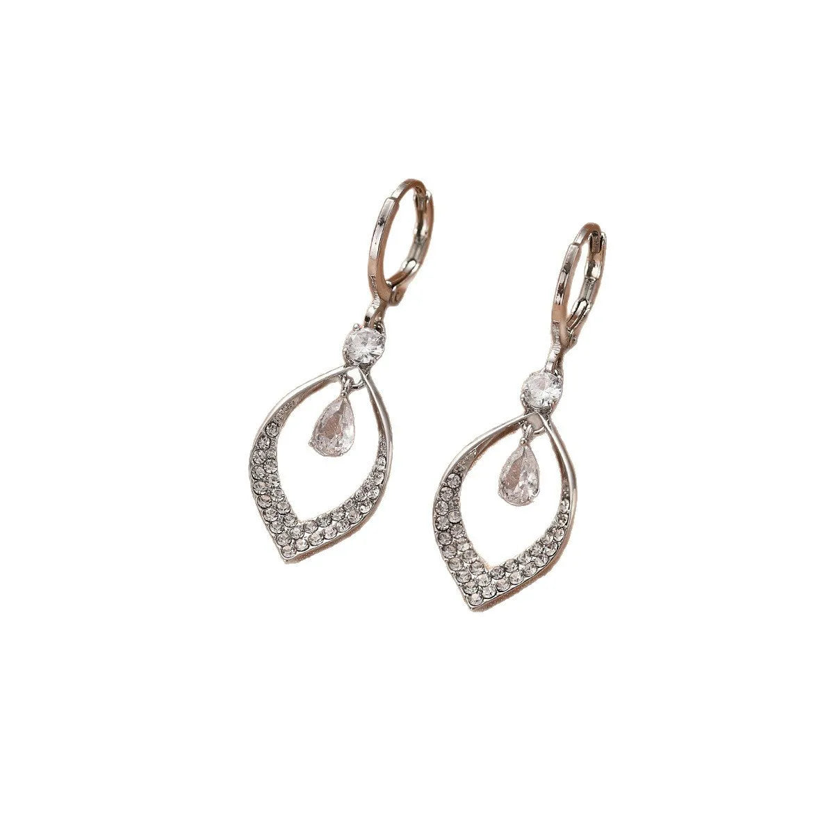 Gold zircon teardrop tassel earrings with electroplated copper construction.