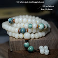 White jade and bodhi seed beaded bracelet with 108 flat round beads in four sizes.