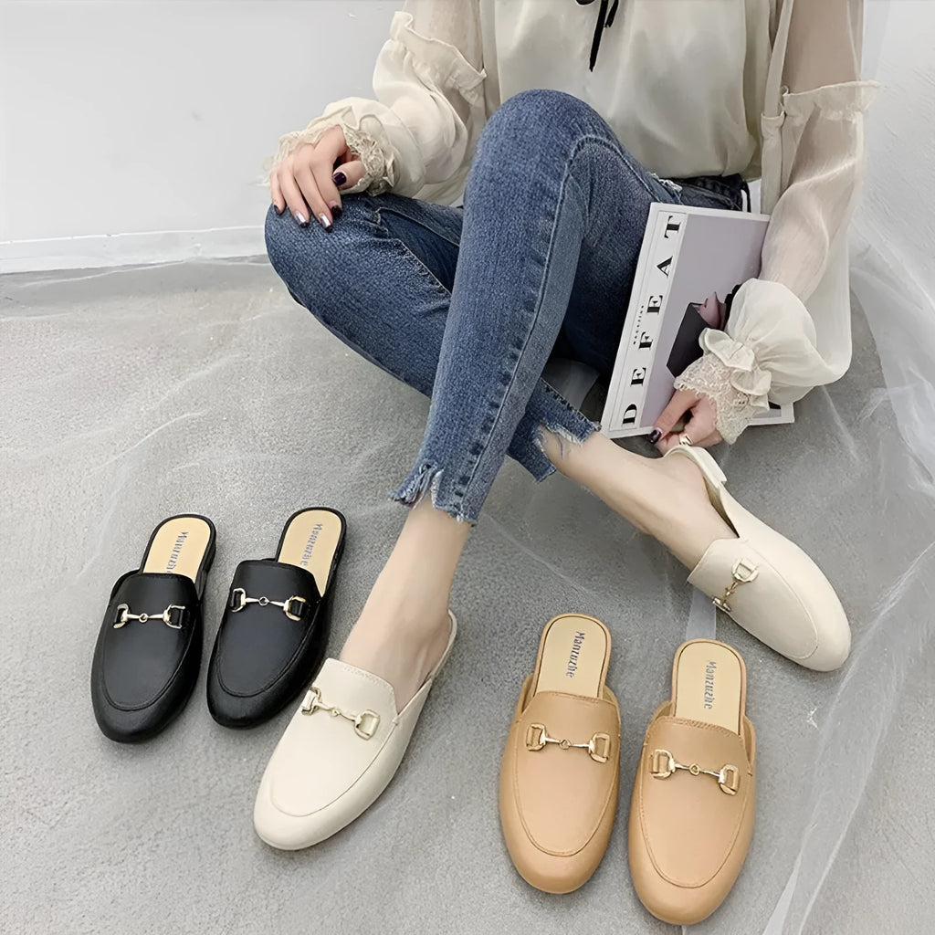 Women's PVC closed toe slippers with buckle fastening in three colour options