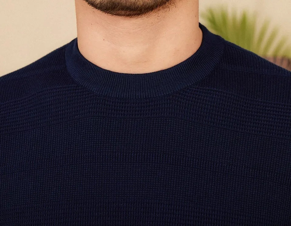 Men's beige retro-style pure cotton short-sleeve t-shirt on a hanger, showing round neck and standard sleeve design.