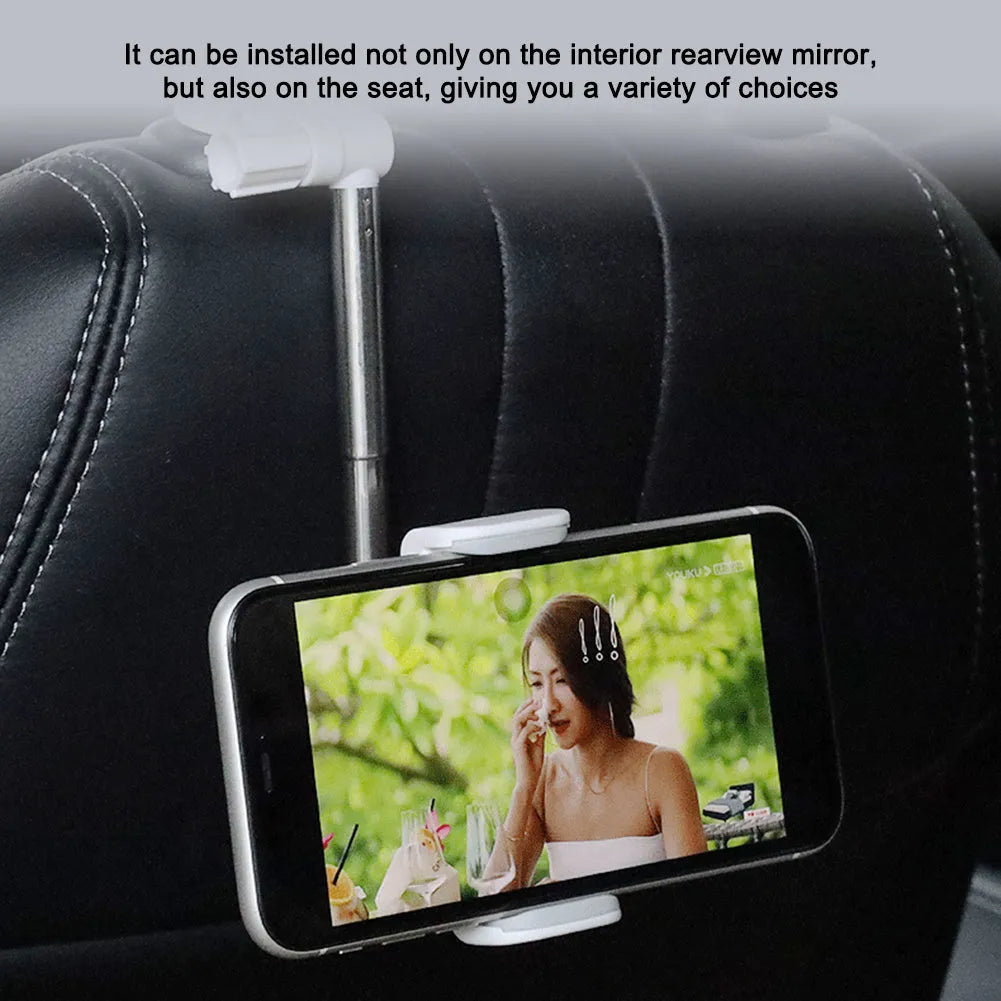 Black ABS car phone holder mounted on a rearview mirror showing 360-degree rotation mechanism