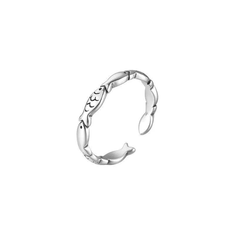 Women's adjustable sterling silver fish ring with carp zodiac design and open mouth sizing