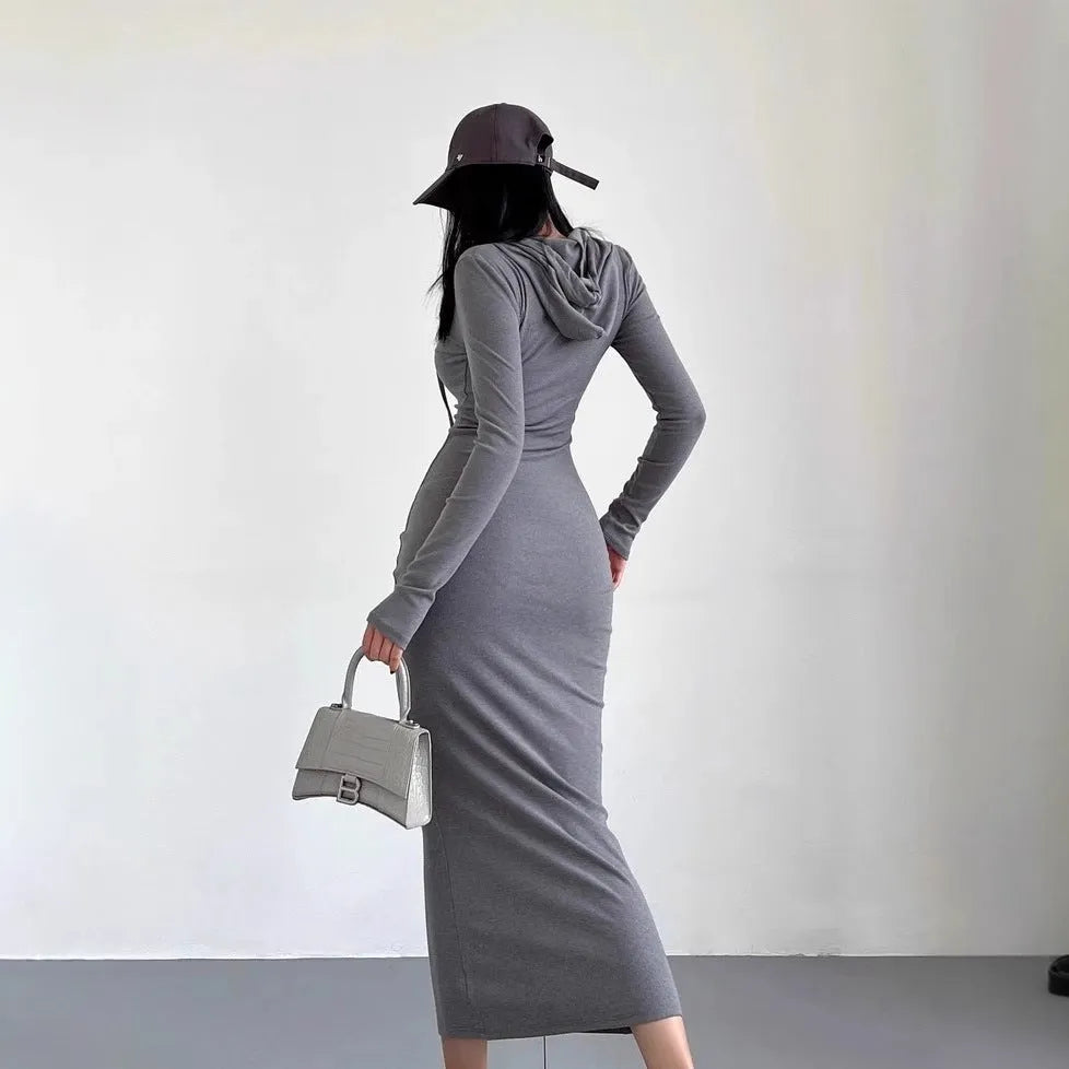 Women's grey hooded long sleeve sheath dress with a high waist on a model.