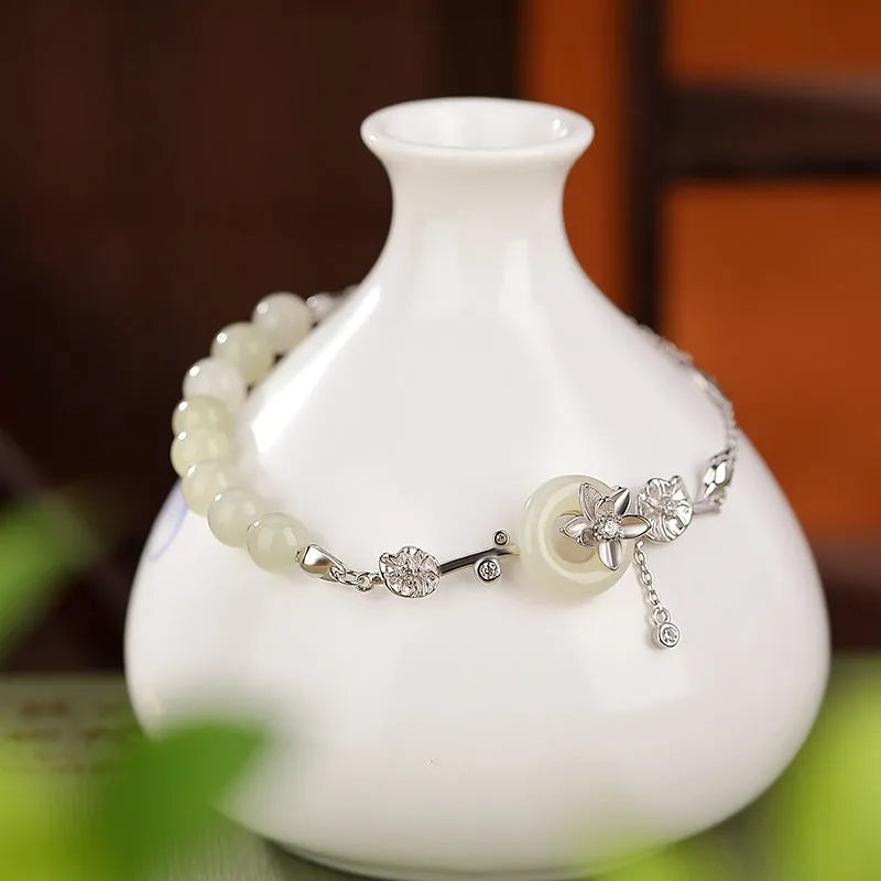 Hetian jade lotus peace buckle bracelet in 925 silver with antique retro design