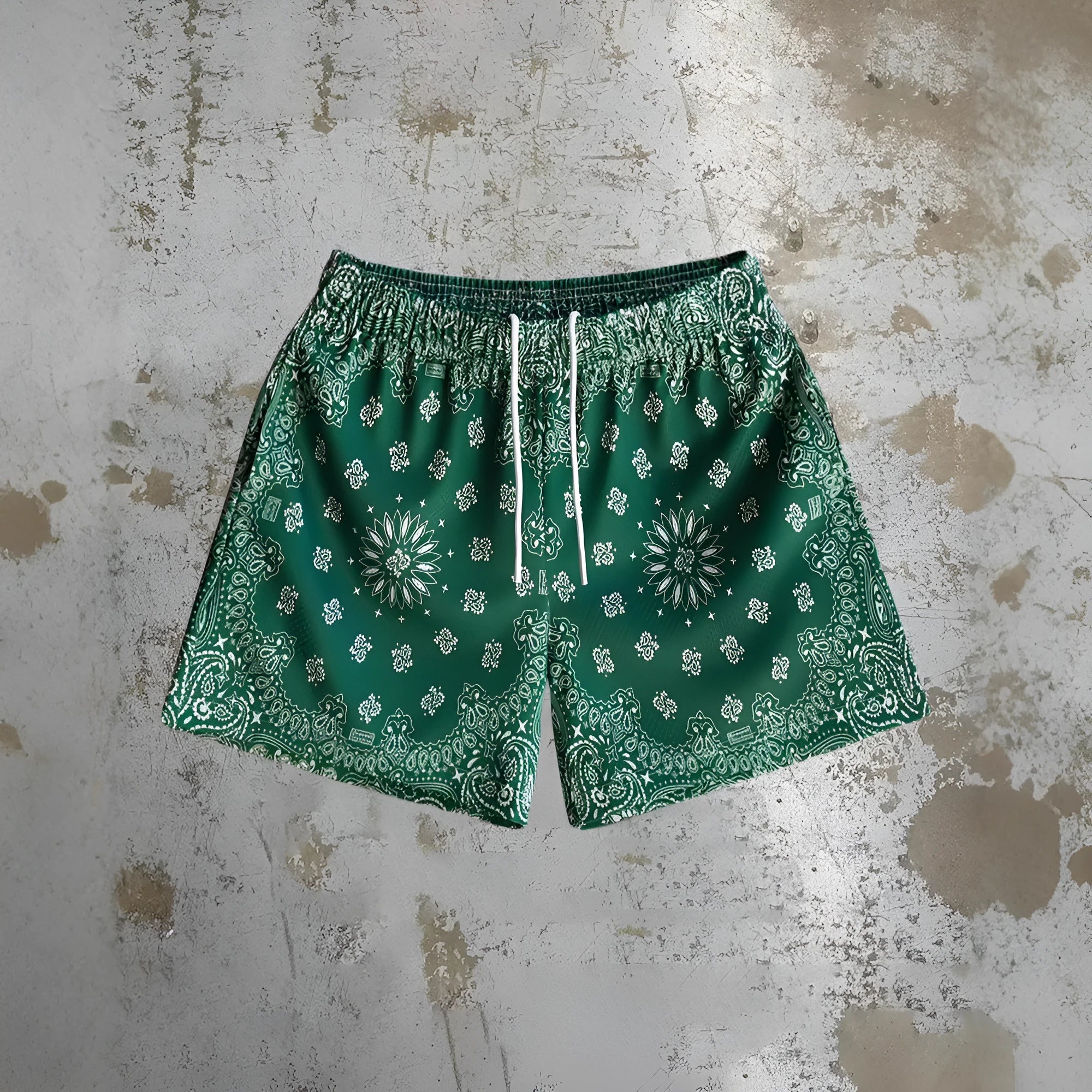 Men's quick-drying digital print beach shorts in loose fit, shown in one of ten available colour patterns.