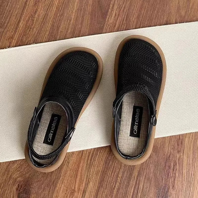 Milky white slip-on shoes with a hollow patterned linen upper and mesh lining, shown on a foot.