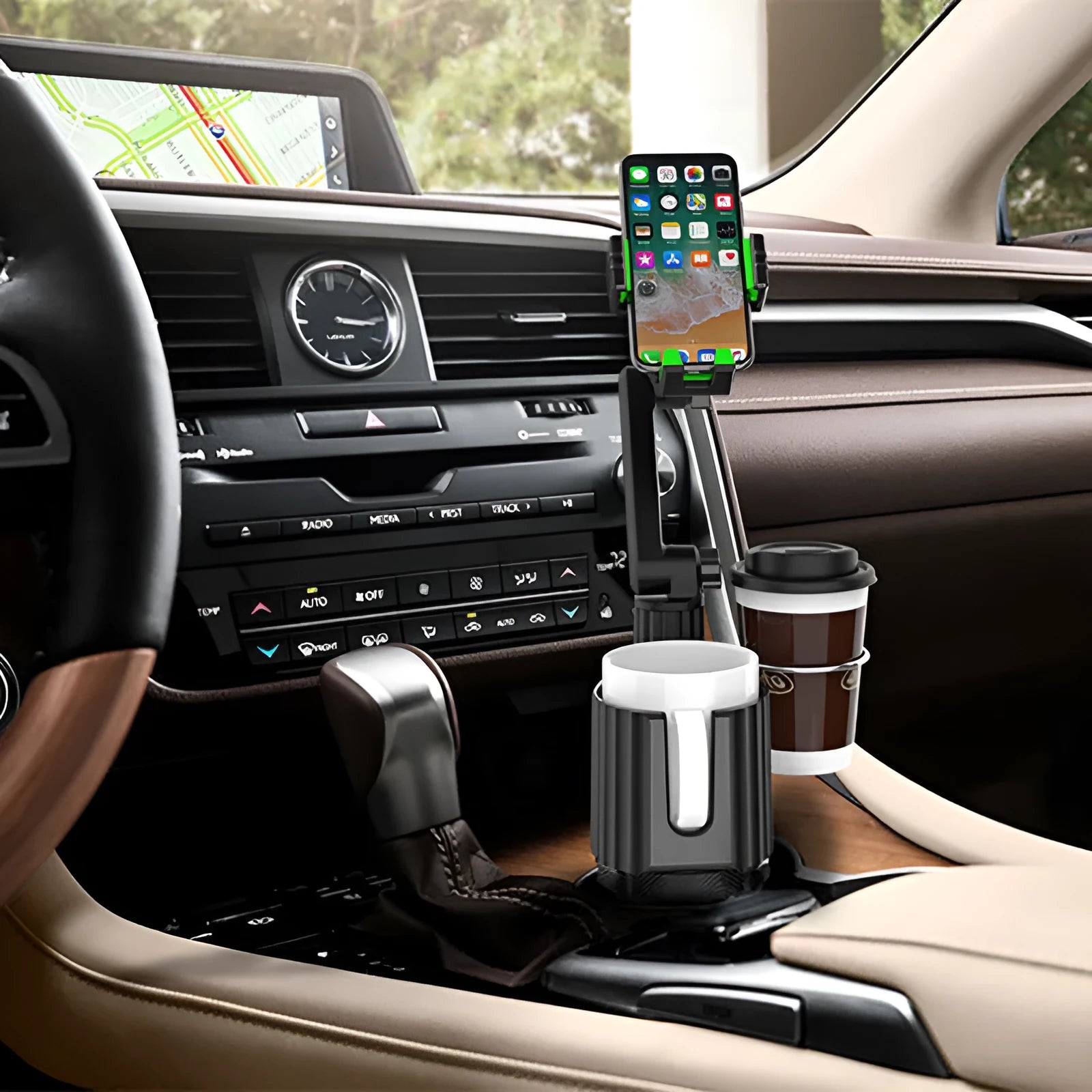 Grey car cup holder expander with integrated mobile phone slot sitting in a vehicle's drink holder