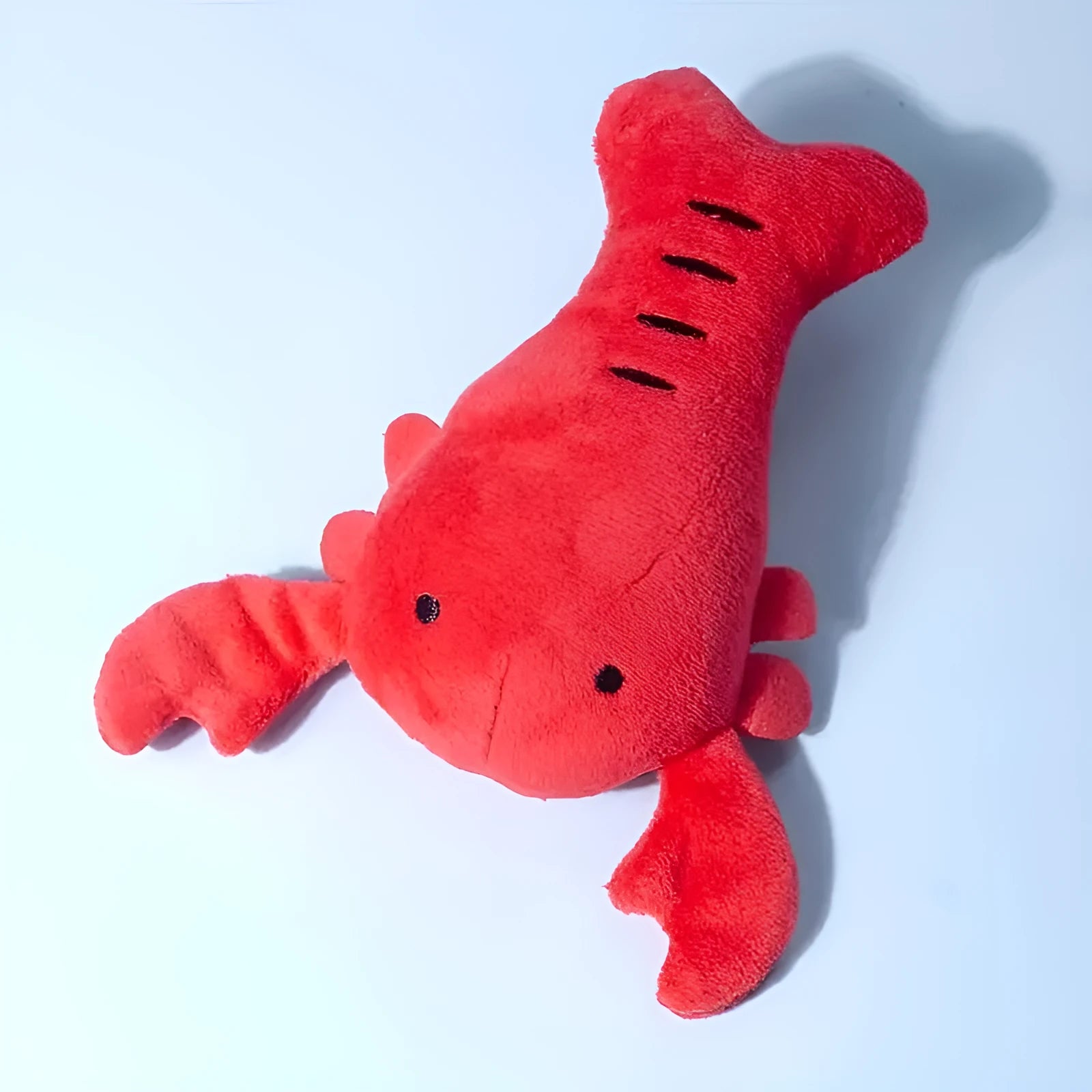Red lobster-shaped squeaky dog toy for small to medium breeds