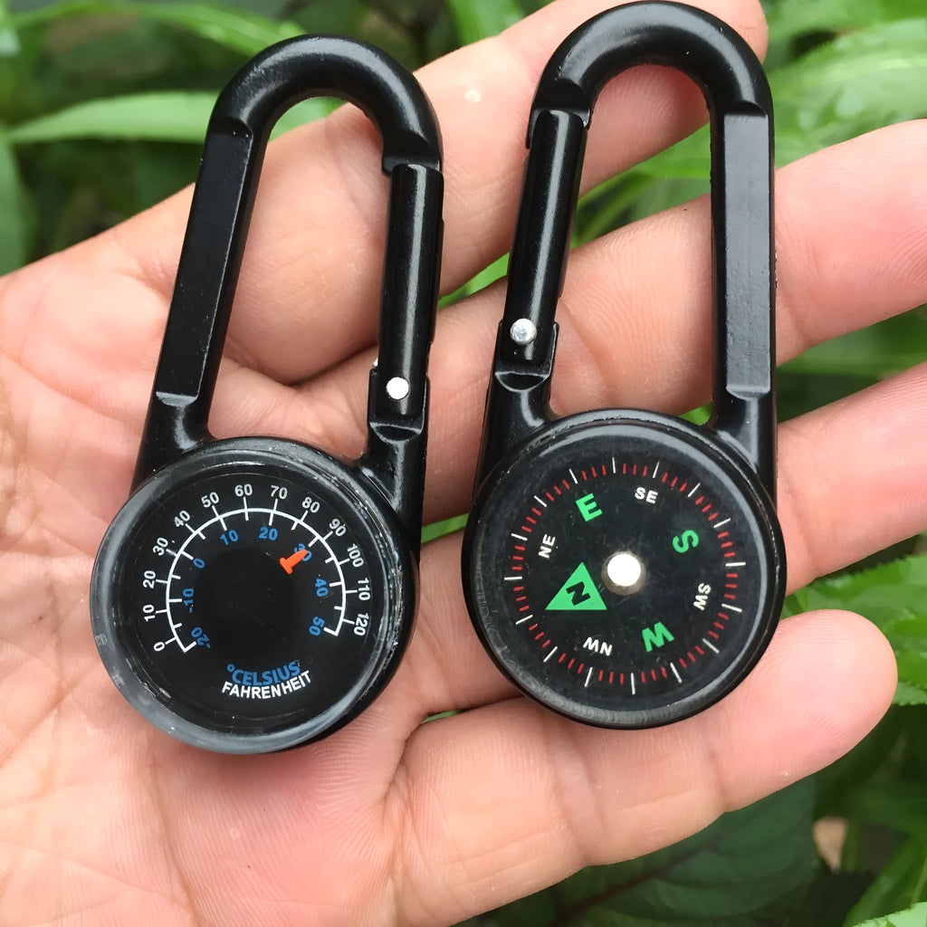 Black zinc alloy outdoor carabiner with integrated compass and thermometer display.