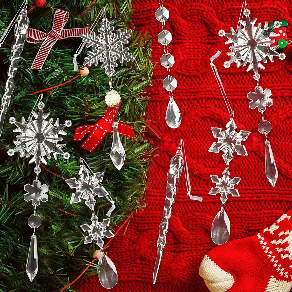 Set of ten clear acrylic icicle and snowflake Christmas ornaments with white hanging ribbons.