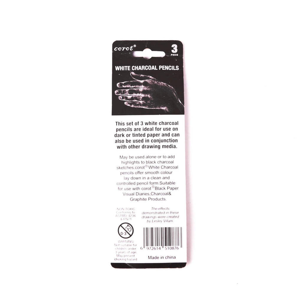 Set of three white charcoal drawing pencils with wooden casings.
