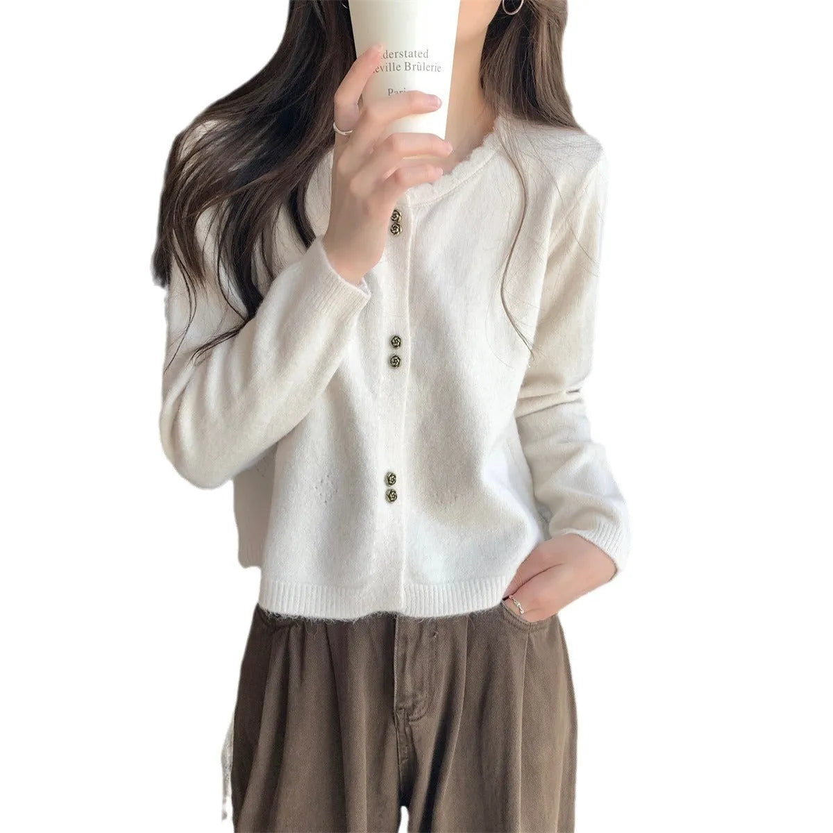 Women's long sleeve acrylic cardigan coat in beige, shown in regular fit.