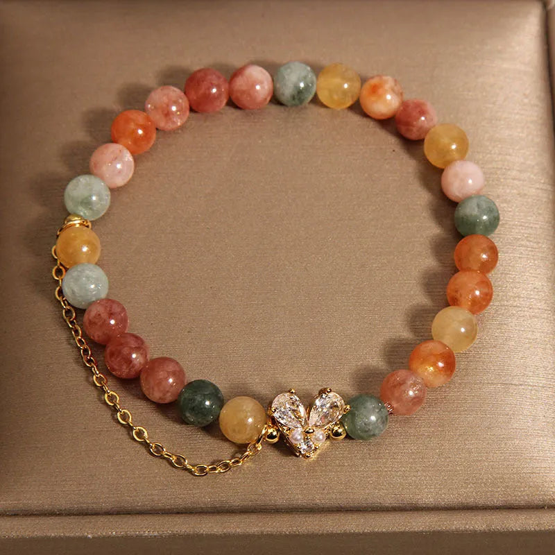 Fu Lu Shou crystal bracelet for women with gold tone metal settings and V-shaped zircon design