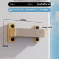 Space capsule shaped cat scratching post with sisal rope, mounted on a window with suction cups.