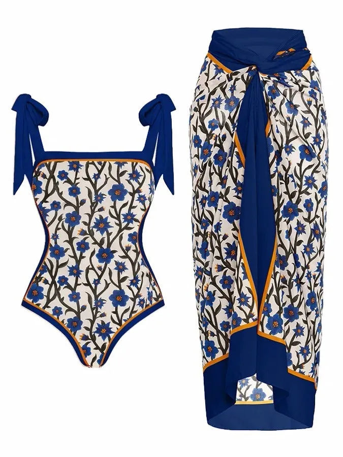 Women's printed two-piece chiffon swimsuit with a matching hip skirt in a floral design.