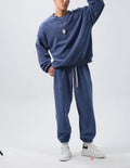 Men's polar fleece sports suit with loose long sleeve coat and matching trousers in winter colours