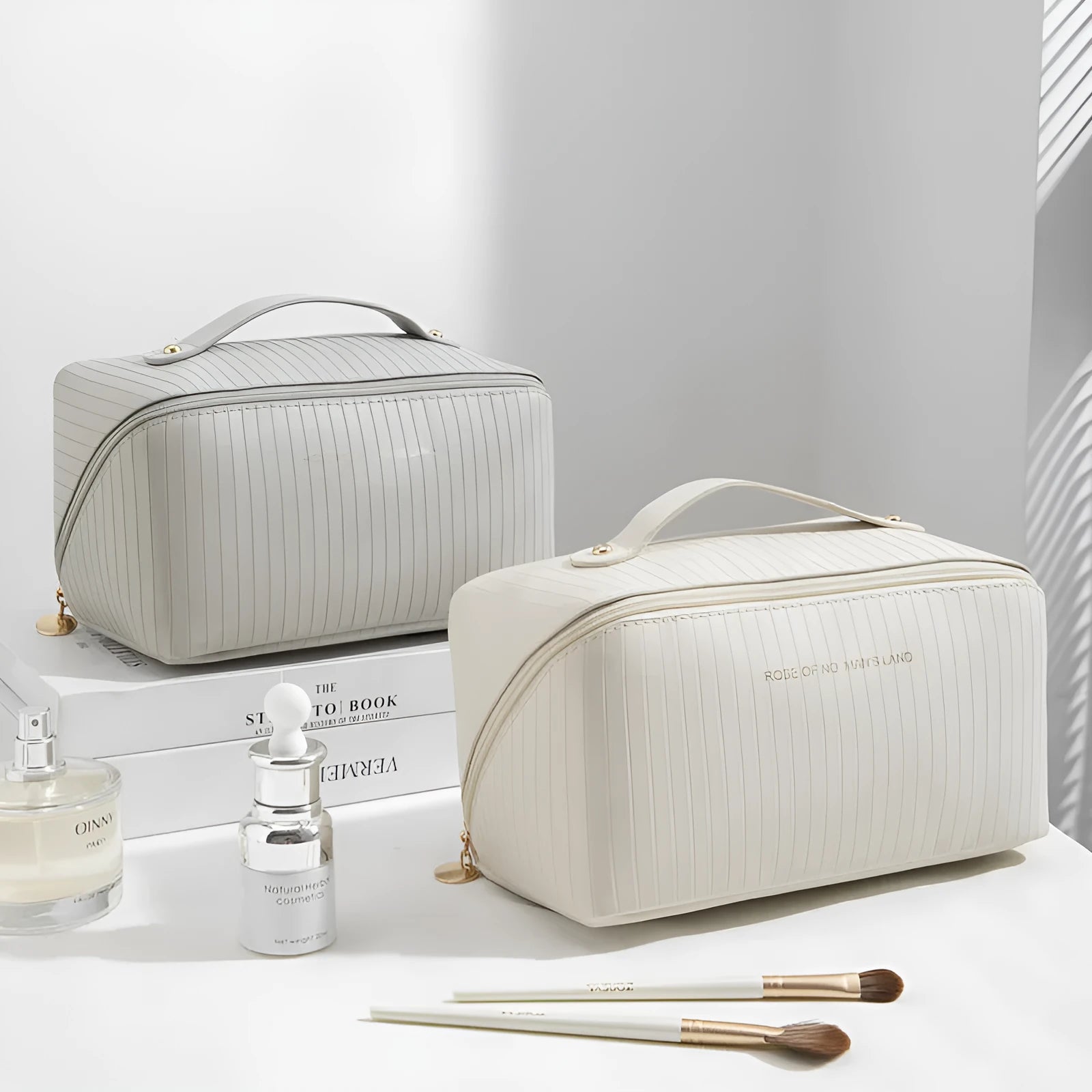 Vertical pattern cubic PU leather makeup bag in beige, shown open to display large capacity interior.