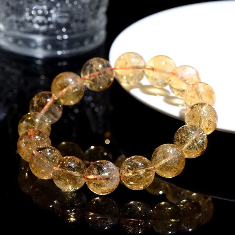 Natural yellow Asestelle citrine bracelet with geometric beads in multiple sizes