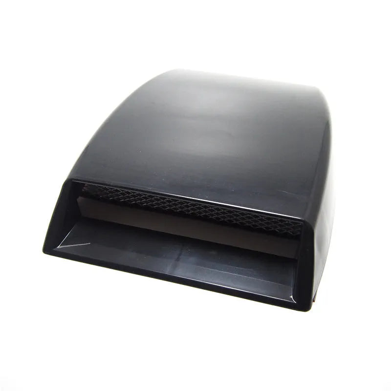 Black, white, and silver ABS plastic car decoration simulation air vent with tapered design.